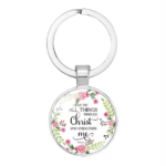 Flowered round Bible verse keyholder with floral design and inspirational message